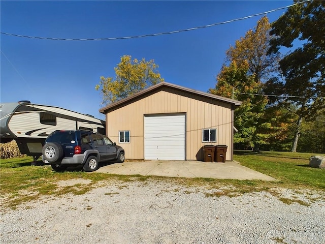 garage with a lawn