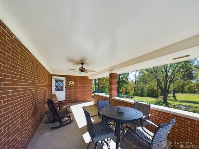 view of patio / terrace featuring ceiling fan