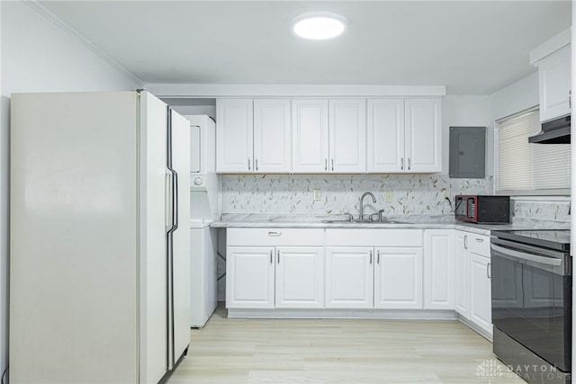 kitchen with electric panel, white cabinetry, sink, and black appliances