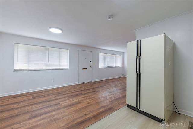 entryway with light hardwood / wood-style floors