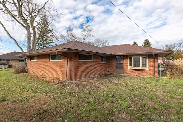 view of front of house with a front yard