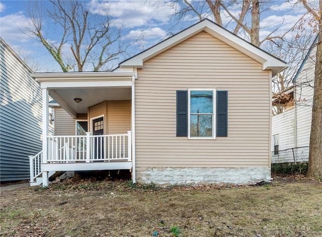 view of home's exterior with a porch