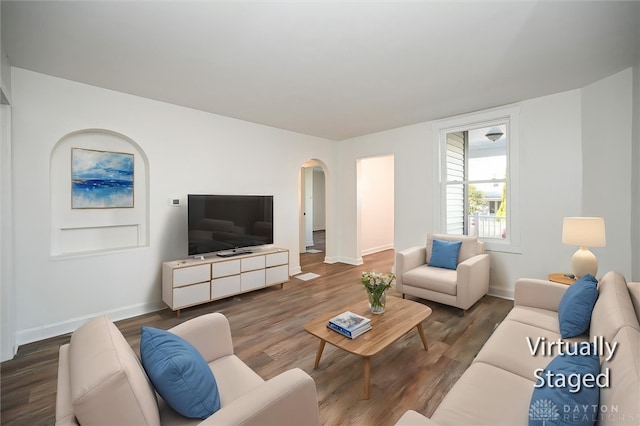 living room with dark wood-type flooring