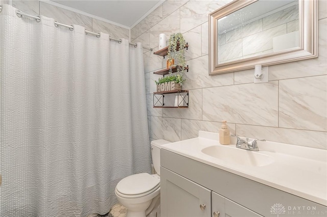 bathroom featuring a shower with shower curtain, vanity, crown molding, tile walls, and toilet