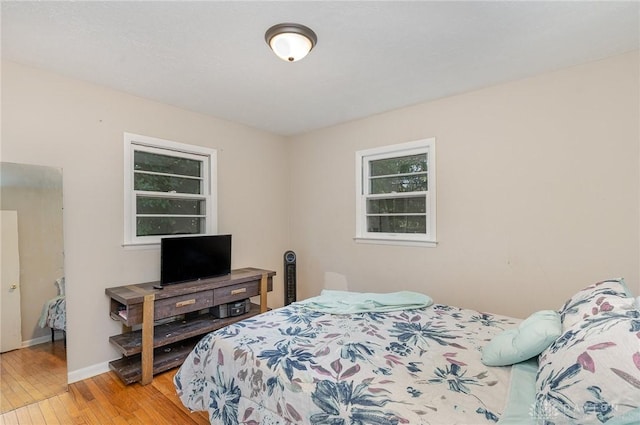 bedroom featuring hardwood / wood-style flooring