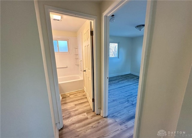 hallway featuring light hardwood / wood-style floors