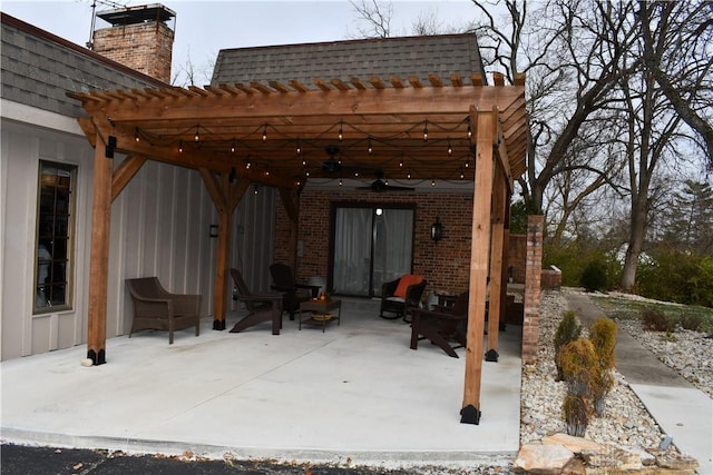 view of patio featuring a pergola and ceiling fan