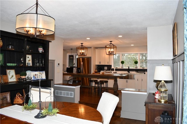 dining space with dark wood-type flooring