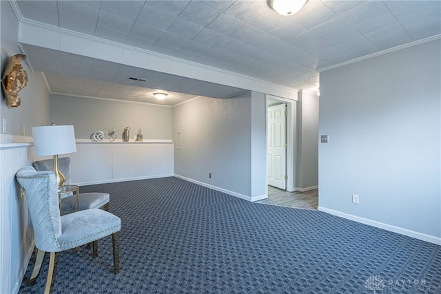 unfurnished room featuring carpet flooring and crown molding