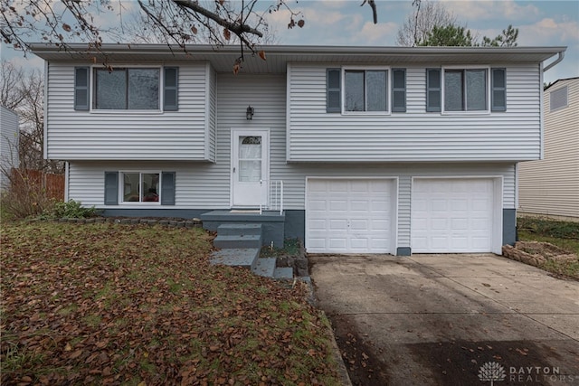 bi-level home featuring a garage