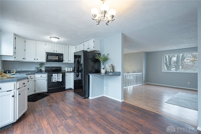 kitchen featuring black appliances, dark hardwood / wood-style floors, and white cabinetry