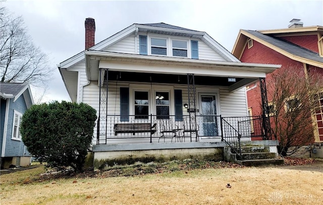 bungalow-style house featuring a porch