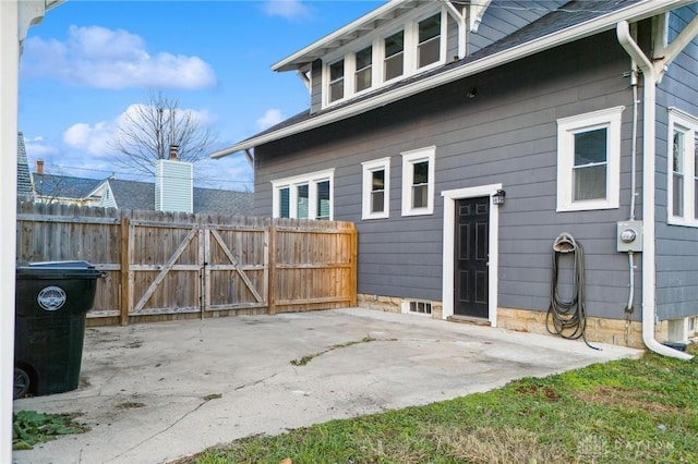 rear view of house featuring a patio area