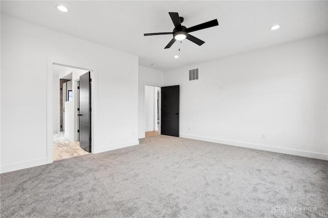 unfurnished bedroom with visible vents, baseboards, ceiling fan, recessed lighting, and light colored carpet