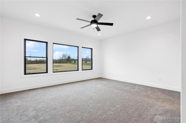 spare room with visible vents, baseboards, ceiling fan, recessed lighting, and carpet flooring