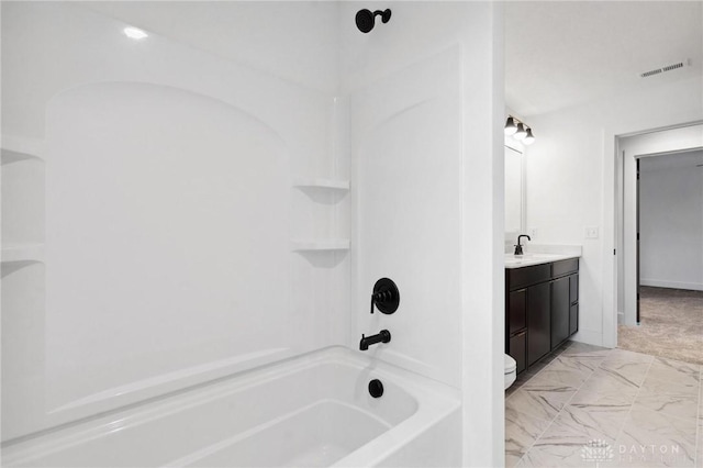 bathroom with visible vents, vanity, marble finish floor, toilet, and bathtub / shower combination