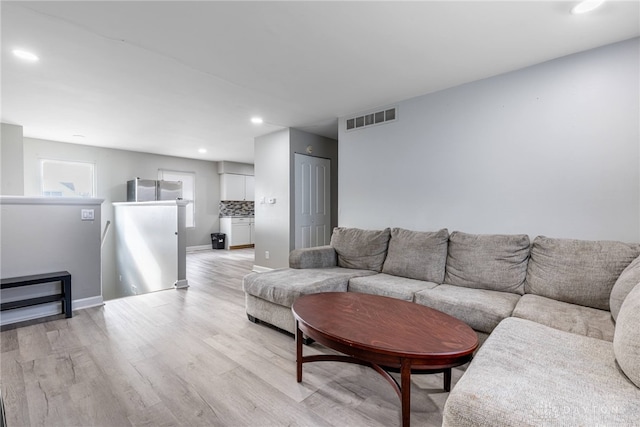 living room featuring light hardwood / wood-style flooring