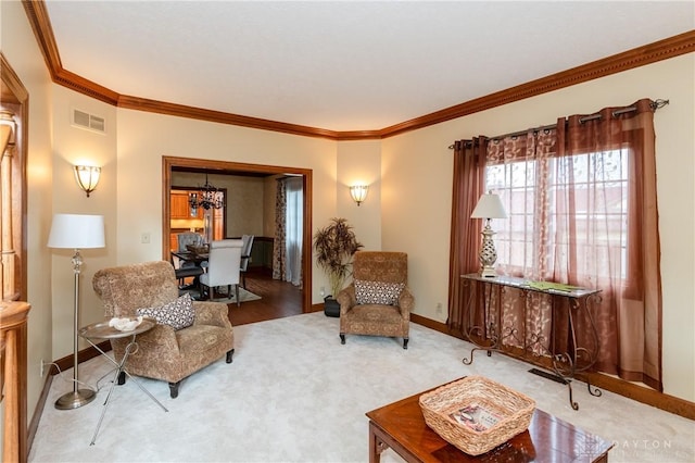 living room featuring carpet floors, crown molding, and a notable chandelier