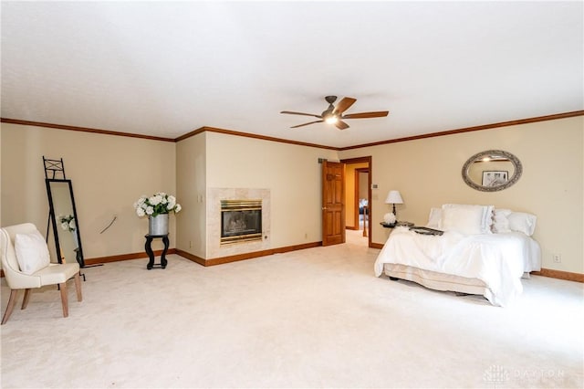 bedroom featuring ceiling fan, a fireplace, carpet, and ornamental molding