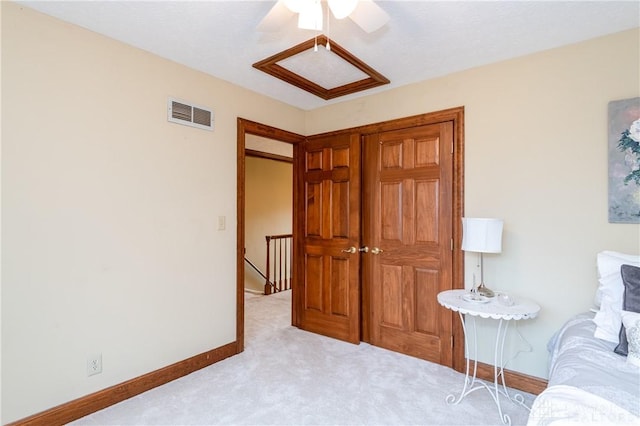 carpeted bedroom with ceiling fan