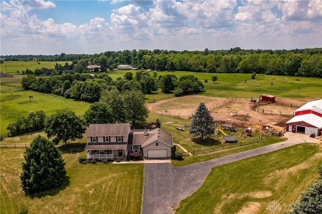 birds eye view of property featuring a rural view