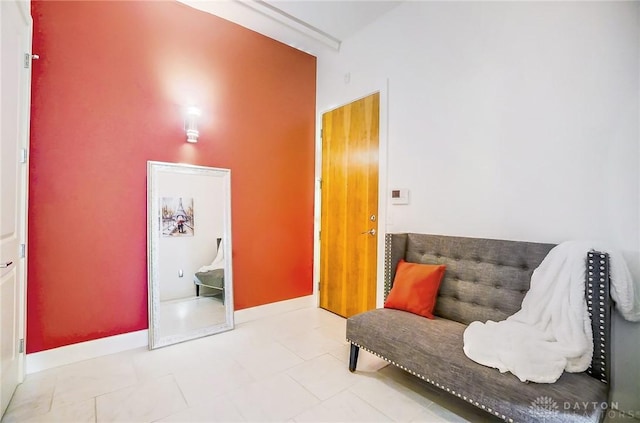 sitting room with light tile patterned floors