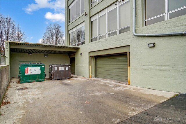 view of side of property with a garage