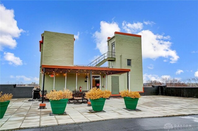 rear view of house featuring a patio area