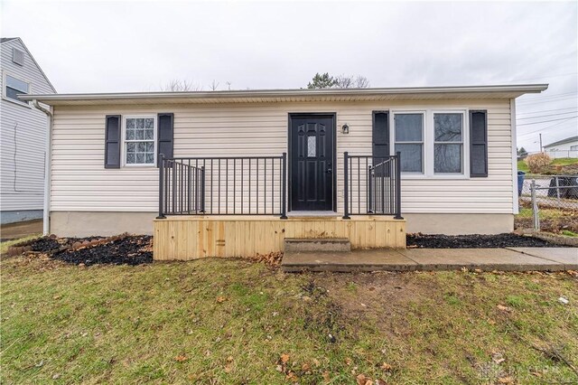 view of front of home with a front yard