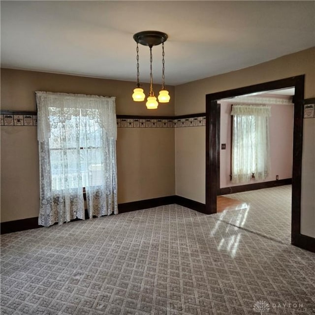 spare room with carpet flooring