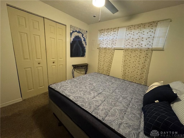 bedroom featuring carpet, a closet, and ceiling fan