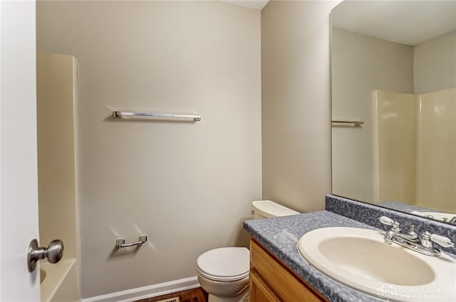 full bathroom with toilet, vanity, and bathtub / shower combination