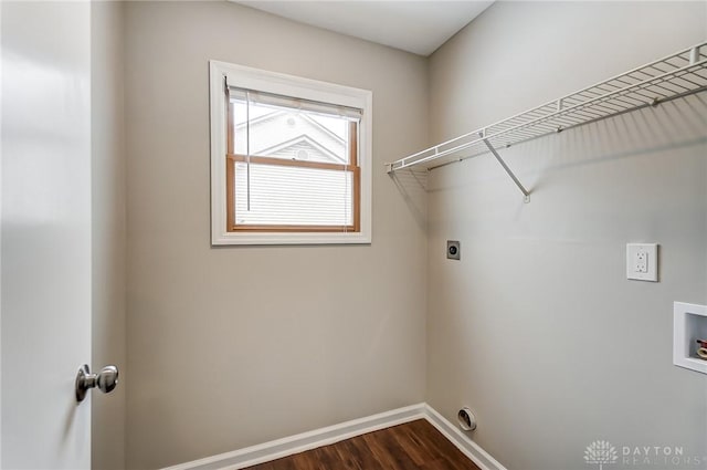 clothes washing area featuring washer hookup, dark hardwood / wood-style floors, and hookup for an electric dryer