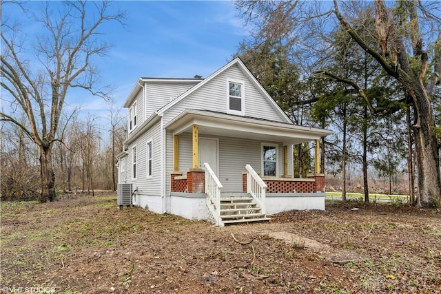 view of front of property with central AC unit and a porch