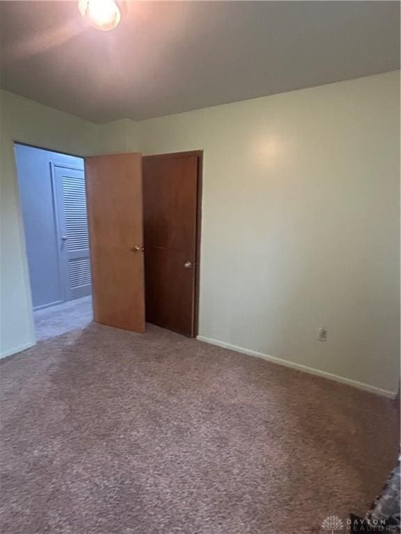 spare room with carpet flooring