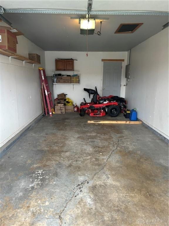 garage featuring a garage door opener