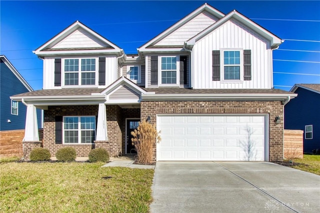 view of front of house featuring a garage and a front lawn