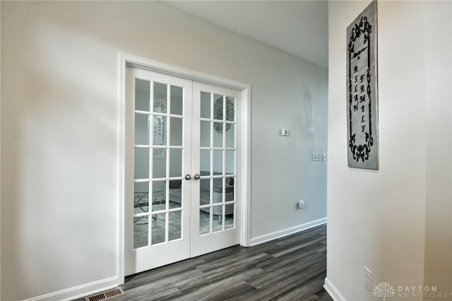 interior space with french doors and dark hardwood / wood-style flooring