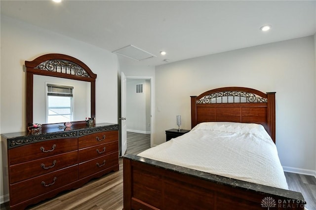 bedroom featuring dark hardwood / wood-style floors