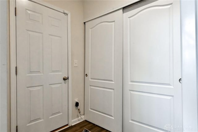 doorway to outside with dark hardwood / wood-style flooring