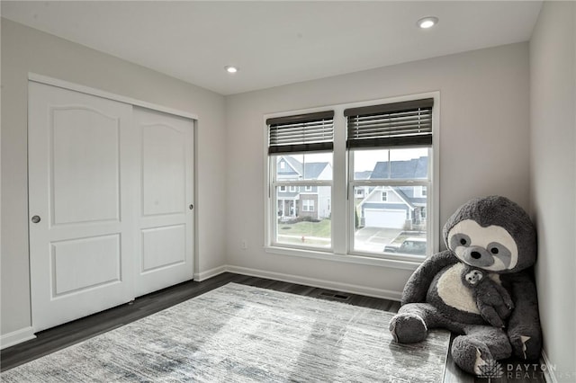 living area with dark wood-type flooring