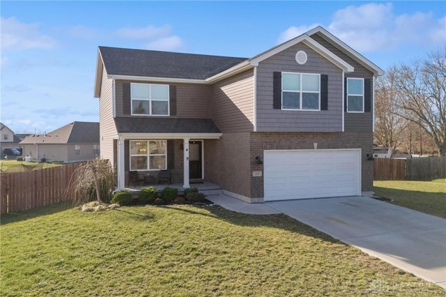 view of property with a garage and a front lawn