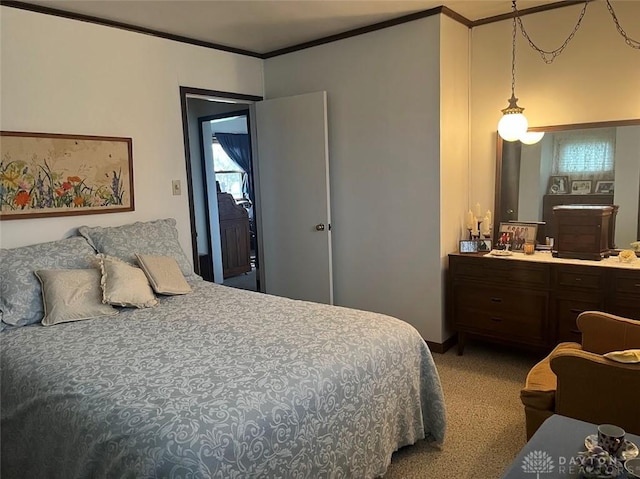 bedroom with carpet flooring and crown molding