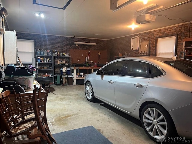 garage featuring a workshop area and a garage door opener