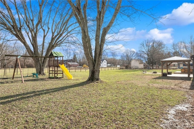 view of yard with a gazebo and a playground