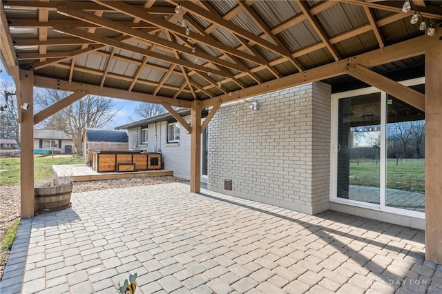 view of patio with a gazebo and a hot tub