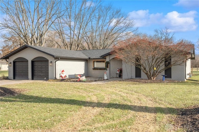 single story home with a garage and a front yard