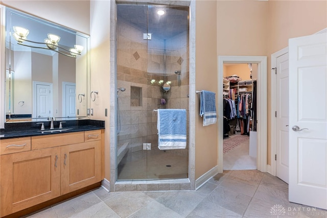 bathroom with vanity and walk in shower