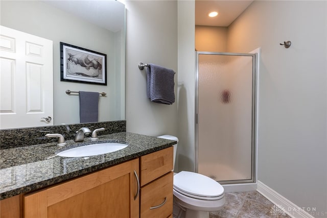 bathroom with tile patterned flooring, vanity, toilet, and a shower with shower door