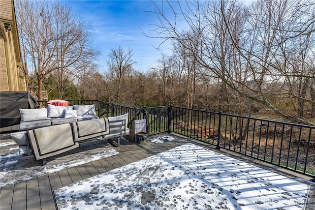 deck with area for grilling and an outdoor hangout area